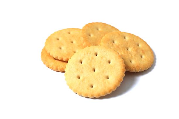 istock Delicious crispy crackers cookies isolated on white  background 2248929030