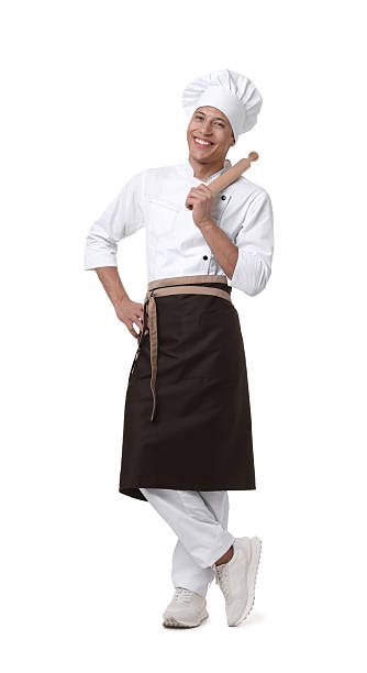 istock Professional chef in uniform with rolling pin on white background 2248930937
