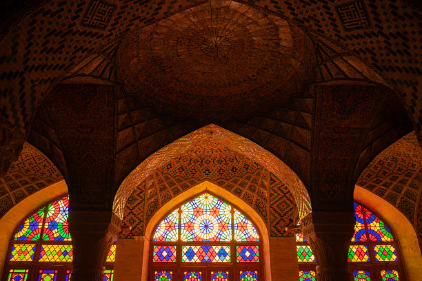 istock Intricate mosque interior with colorful stained glass 2248930985