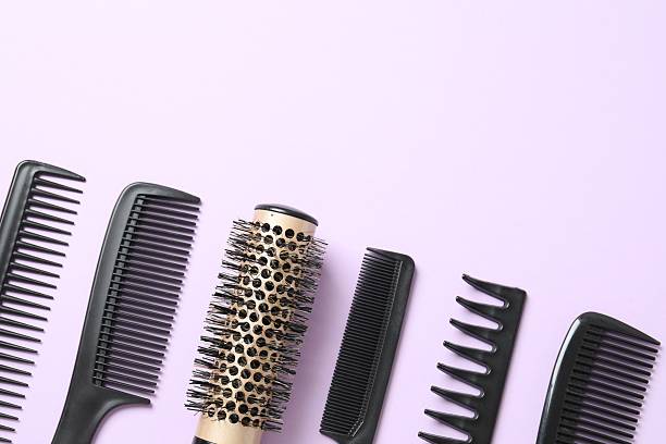 istock Hairdresser tools on color background, top view 2248931155