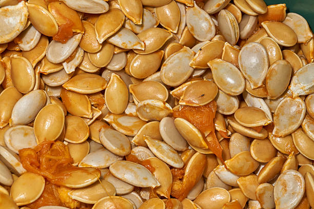 istock Pumpkin Seeds Close-Up. Fresh Pumpkin Seeds After Extraction. 2248936787