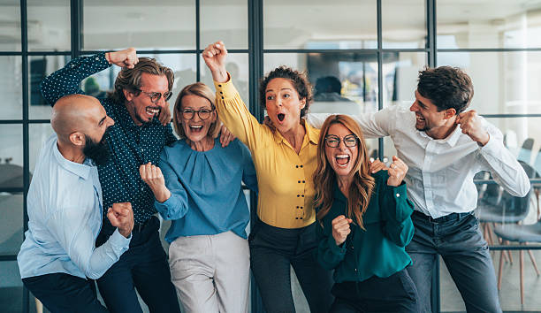 istock Business team celabrating after achieving goals 2248938899