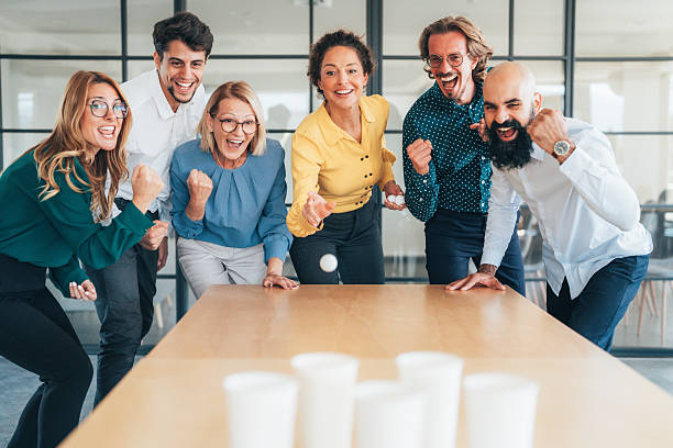 istock Cheerful business team having fun in the office 2248938911