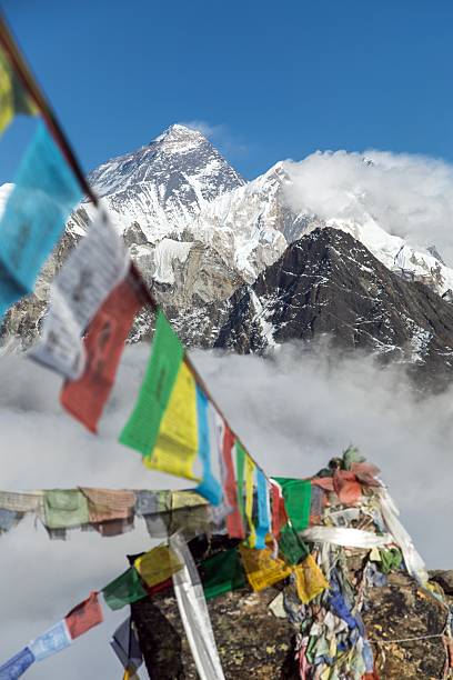 istock Mount Everest Lhotse peak buddhist prayer flags mountain 2248939585