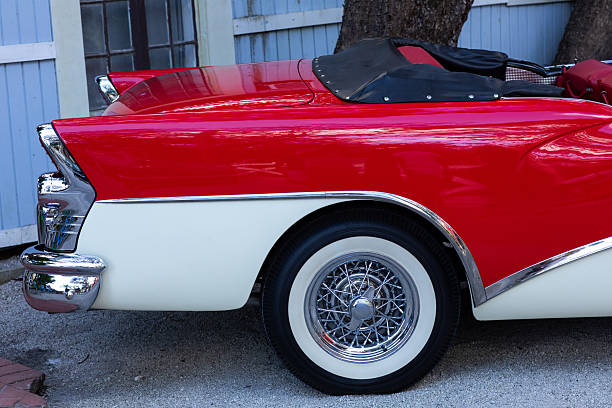 Chicago, Illinois, USA - September 08, 2024: Lotus Elan sportscar vehicle, corner view. Red convertible sportscar. Modern Lotus Elan car. Lotus Elan at Chicago