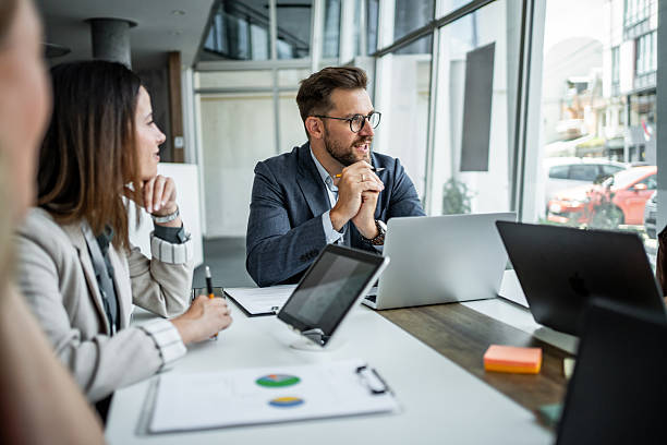 istock Business people collaborating on a corporate strategy meeting 2248944724