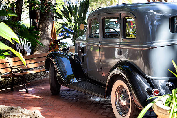 istock Side rear view of grey and black classic American car 2248944743
