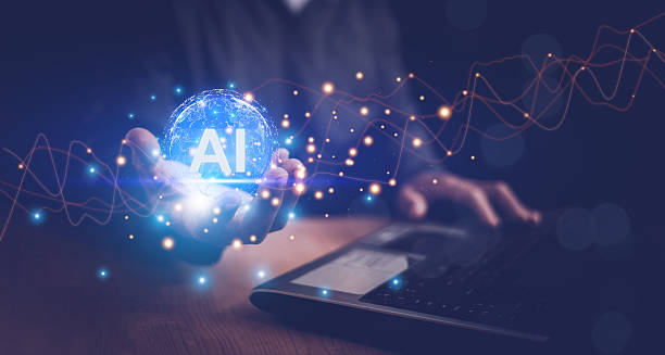 istock Artificial intelligence or AI of futuristic technology concept, Hand holding virtual AI technology and using laptop computer, Internet of Things, futuristic innovation, smart communication network. 2248945995
