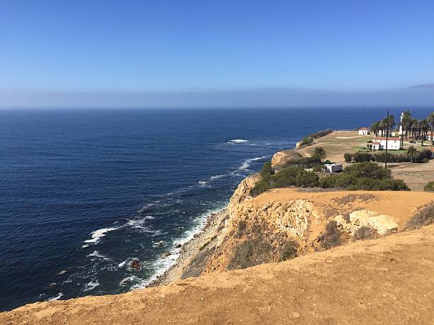 istock Scenic Coastal View at Sunset Showcasing Cliffs and Ocean Waves Near a Tranquil Landscape 2248971130