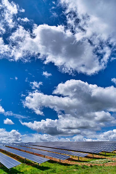 istock A wide solar panel farm set over green spring meadows under a sunny sky with scattered clouds. Perfect for renewable energy, sustainability, environment and technology concepts. 2248975416
