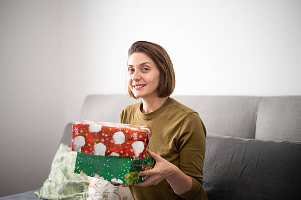 istock Woman with  christmas presents 2248979837