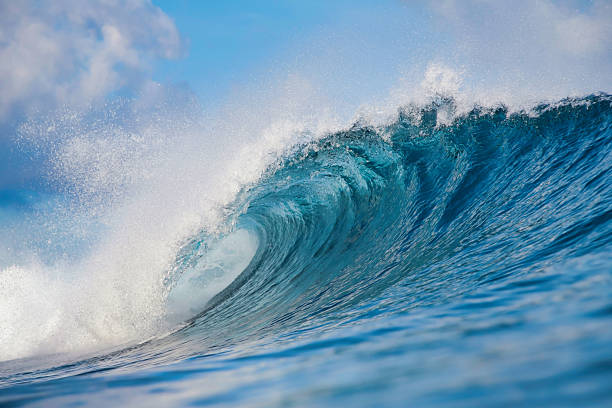 istock Majestic ocean swell with shimmering sunlight and foamy crest 2248980042
