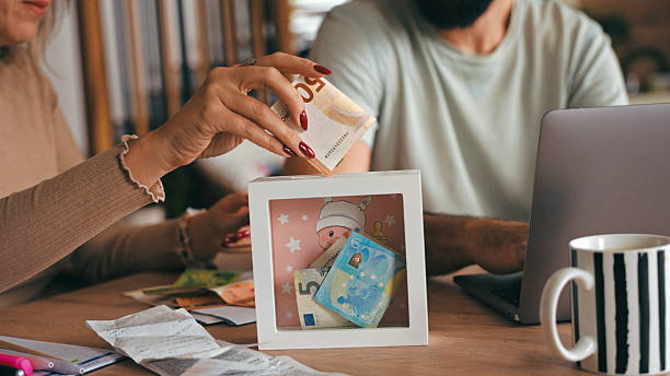 istock Caucasian Couple Organizing Financial Documents and Budget Plans Together 2248981972