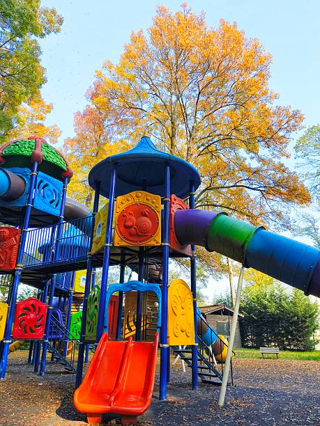 istock Children play park in autum tree background 2248984948