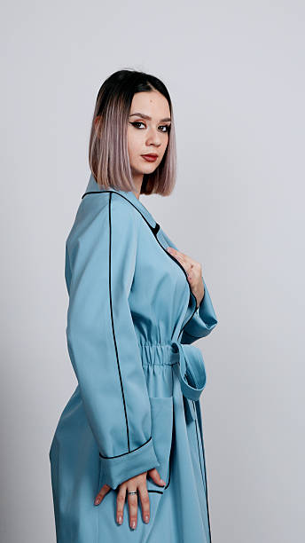 istock Woman in blue coat with black pips 2248986845