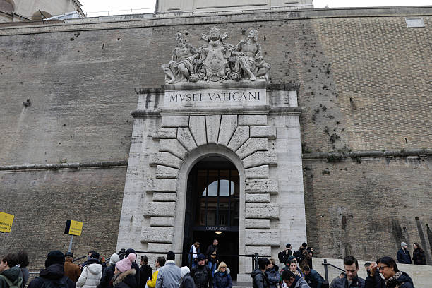 Rome, Italy - January 11, 2024: People wait in queue to enter the Vatican Museum.