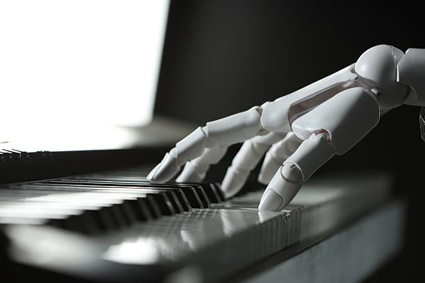 istock Artificial intelligence. Robot hand playing synthesizer on color background, closeup 2248993080