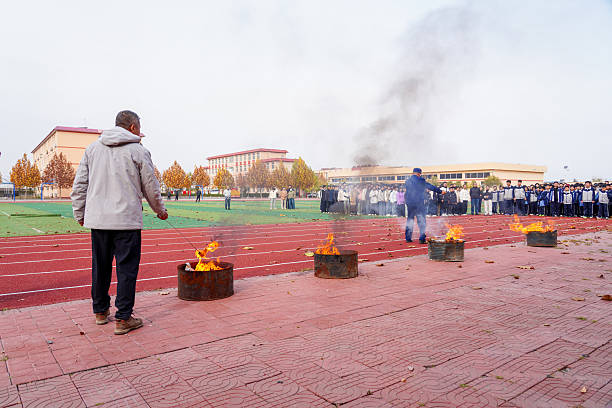 Luannan County, China - November 7, 2025: Teachers light fires and conduct fire drills at the scene