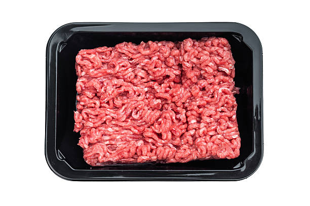 istock Uncooked ground mince beef packaged in black container on white backdrop ideal for butcher, grocery and cooking preparation visuals. 2249002475