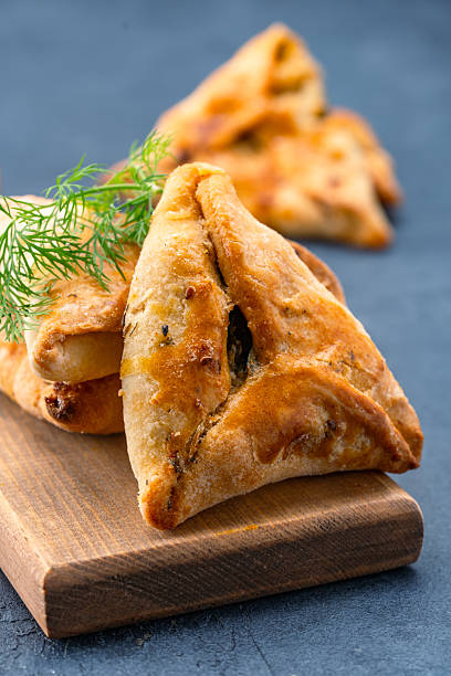 istock Homemade triangular pastry with spinach and cheese. A traditional Middle Eastern dish. 2249003563