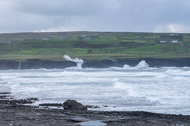 istock The Doolin Pier in Ireland. A rocky landscape under a grey sky with clouds. 2249005081