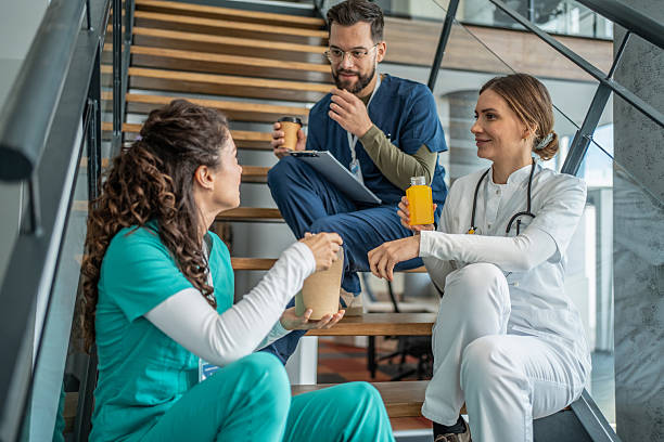 istock Medical team taking an informal break on stairs 2249005447