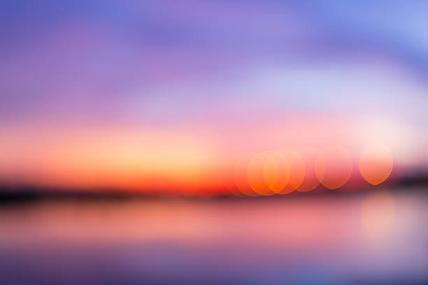 istock Twilight sky background with blurred focus,Blurred sunset background with soft pink, orange, and purple gradients. Perfect for design projects, wallpapers, or tranquil backdrops. 2249012194