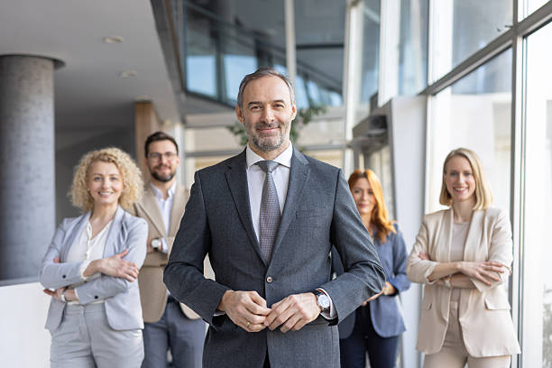 istock Team of Smiling Professionals in Bright Office 2249012451