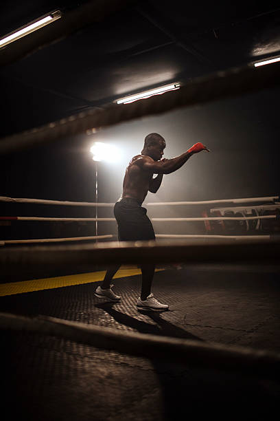 istock Athlete in the Ring training with red gloves 2249017619