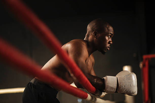 istock Male Boxer in Ring Ready to Fight 2249017646