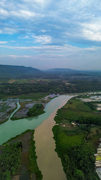 istock Drone View of Turquoise Blue River with Mountain Background 2249019871