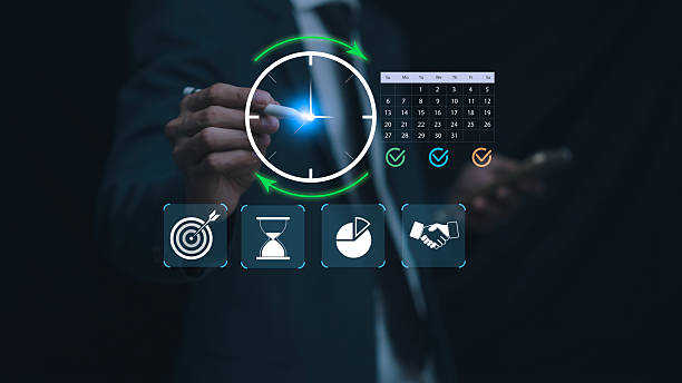 istock Time management concept showing a business professional interacting with a digital clock, calendar, and productivity icons. Modern workflow planning, scheduling, strategy, and efficiency improvement. 2249021541
