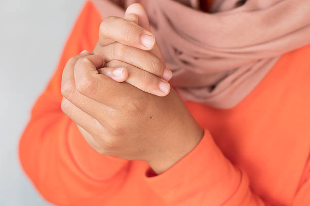 istock Islamic Worship Moment closeup hand make a wish 2249027647