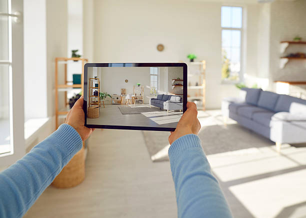 istock Hands holding device, taking room interior design picture with tablet for rent, sell apartment 2249031387
