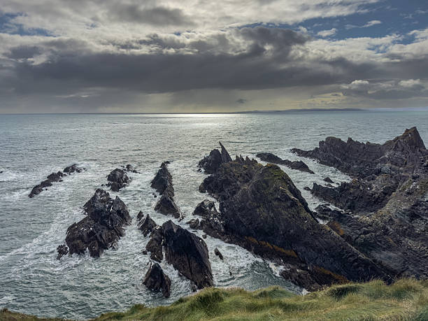 istock Jagged Rocks Rising from the Sea 2249037594