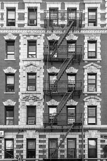 istock old iron escape ladders at a historic building in New York 2249038053