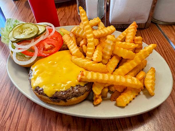 Diner-Style Cheeseburger and Fries Served on a Plate