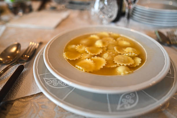 Plate of tortellini in broth, a traditional italian meal, ready for dinner