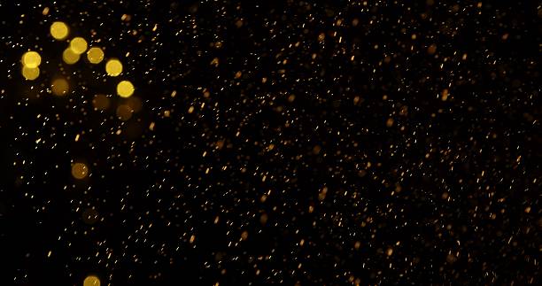 istock Golden Bokeh Lights on Dark Background 2249052265