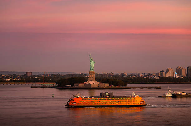 istock Statue of Liberty at Dawn with Staten Island Ferry 2249062083