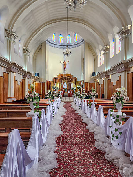 istock View of a religious temple aisle with floral decorations for a wedding 2249080004