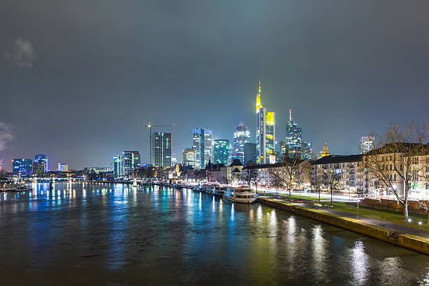 istock skyline of Frankfurt by night with river Main 2249080225