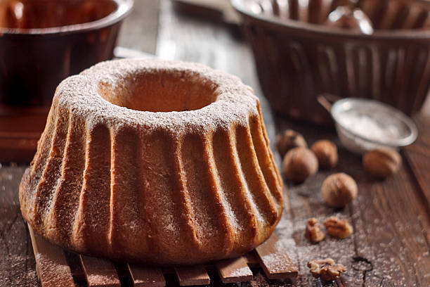 istock Potica - traditional Slovenian bread cake. Sweet bread roll stuffed with walnuts and sprinkle with sugar 2249083876