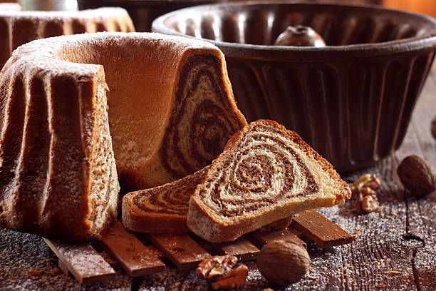istock Potica - traditional Slovenian bread cake. Sweet bread roll stuffed with walnuts and sprinkle with sugar 2249083983