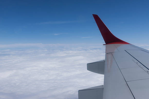 istock View from the plane wing and clouds, Italy 2249094044