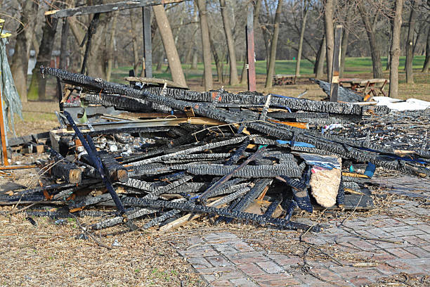 Burned Wooden House Cabin After Fire Damage Remains