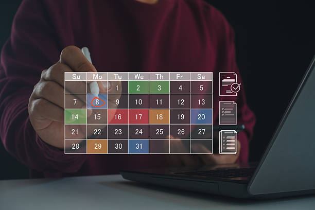 istock Modern digital scheduling concept showing person marking calendar on virtual interface, symbolizing task planning, deadline management and efficient time organization for business productivity. 2249097754