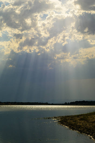 istock Sun Rays Filtering Through Dramatic Clouds Over Gabriel y Galan Reservoir 2249098268