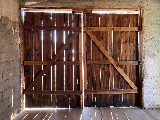 istock Interior view of an old empty garage with concrete floor 2249104793