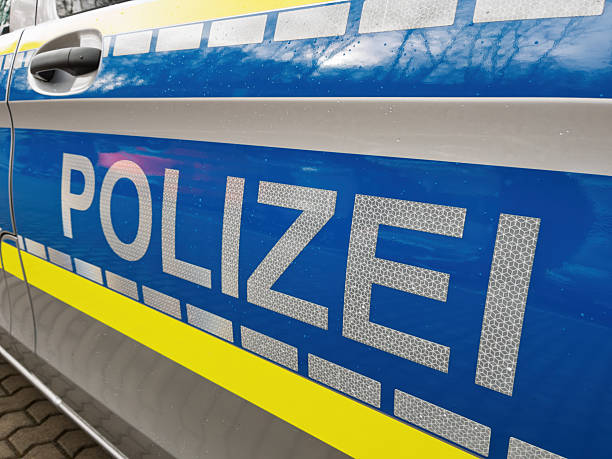 istock Police Vehicle Close-Up with Decals in Urban Setting 2249107609